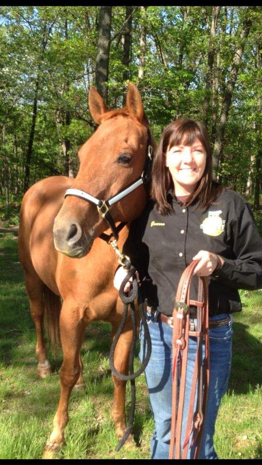 Deanna with her horse at Shire Gate Farms